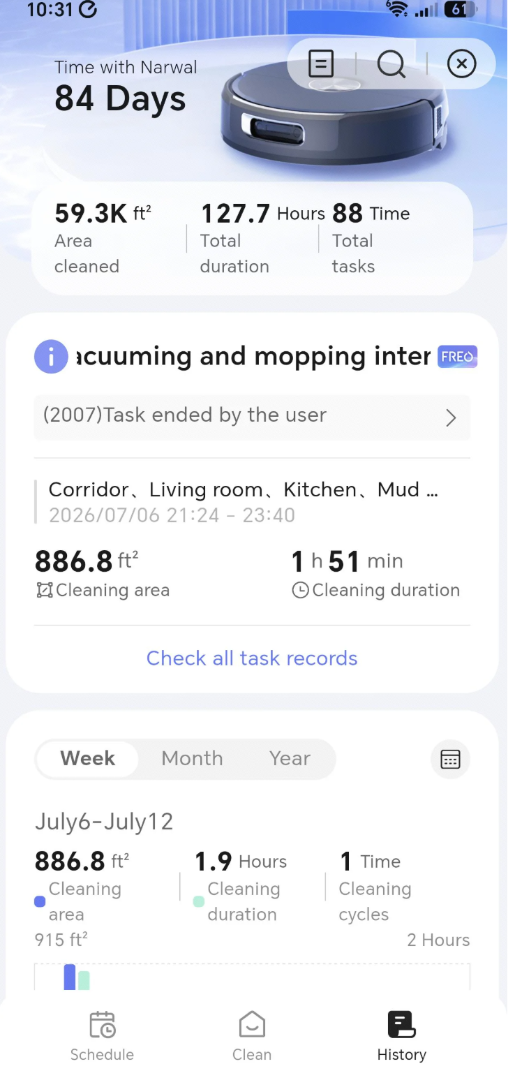 Narwal Flow 2 Base Station Home Setup Narwal Flow 2 robot vacuum and self cleaning base station sitting on dark hardwood floors