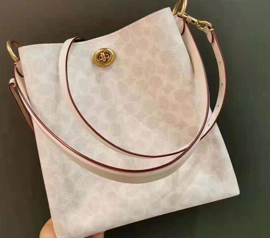 COACH 蔻驰Charlie Bucket 水桶包白色老花5折$187.5