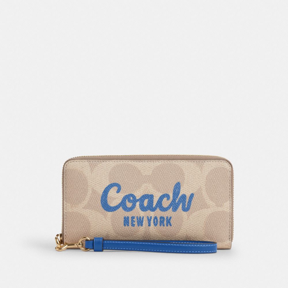 coach long zip around wallet in signature canvas with coach graphic CZ330-IMXIG