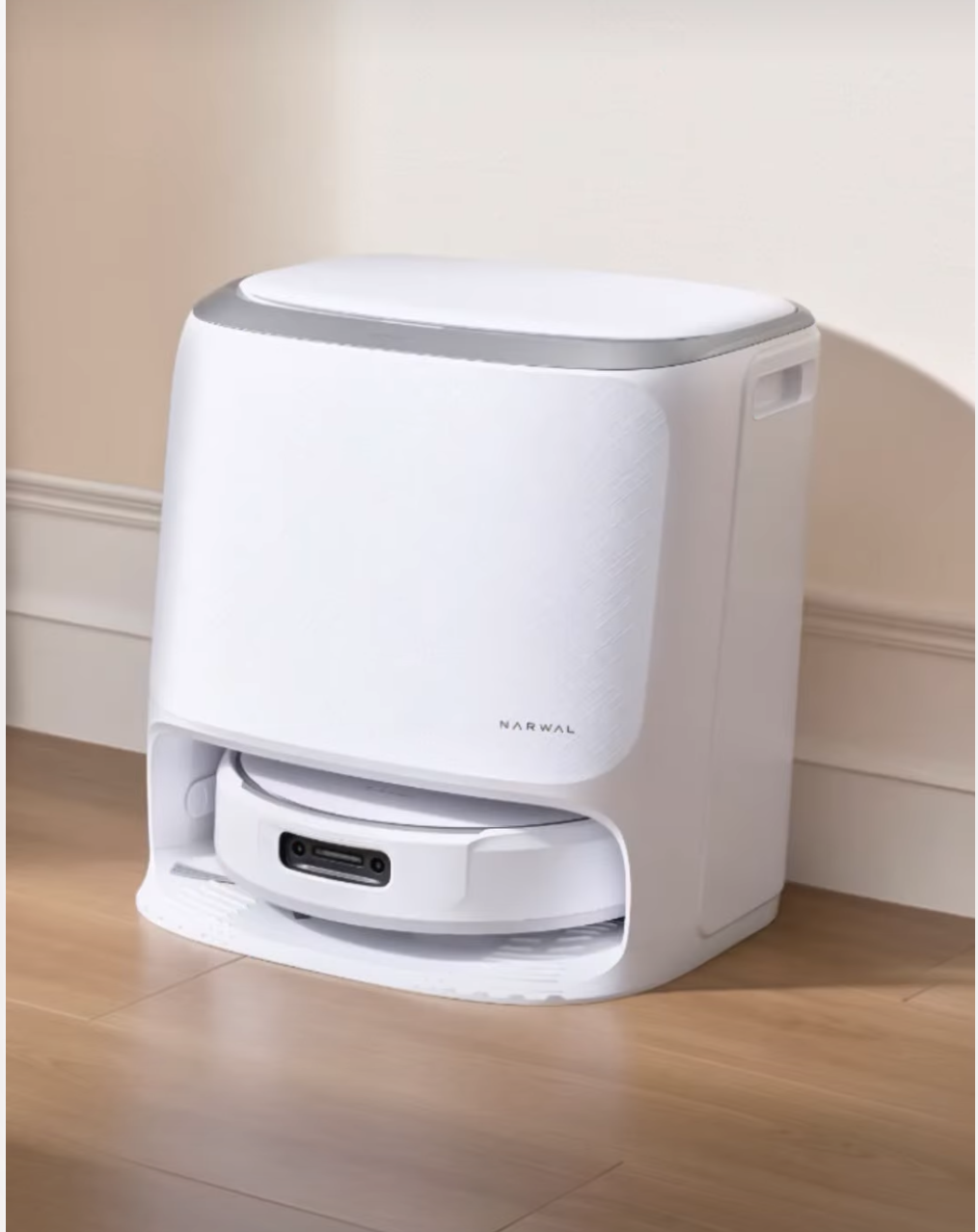 Narwal Freo 20 robot vacuum and mop dock station in stylish living room setup