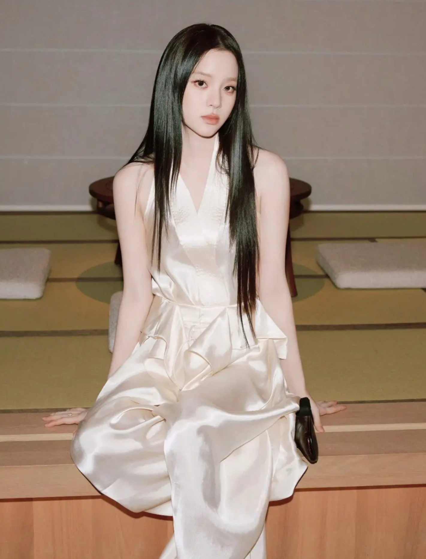 Ouyang Nana styling satin trousers for a luxury look