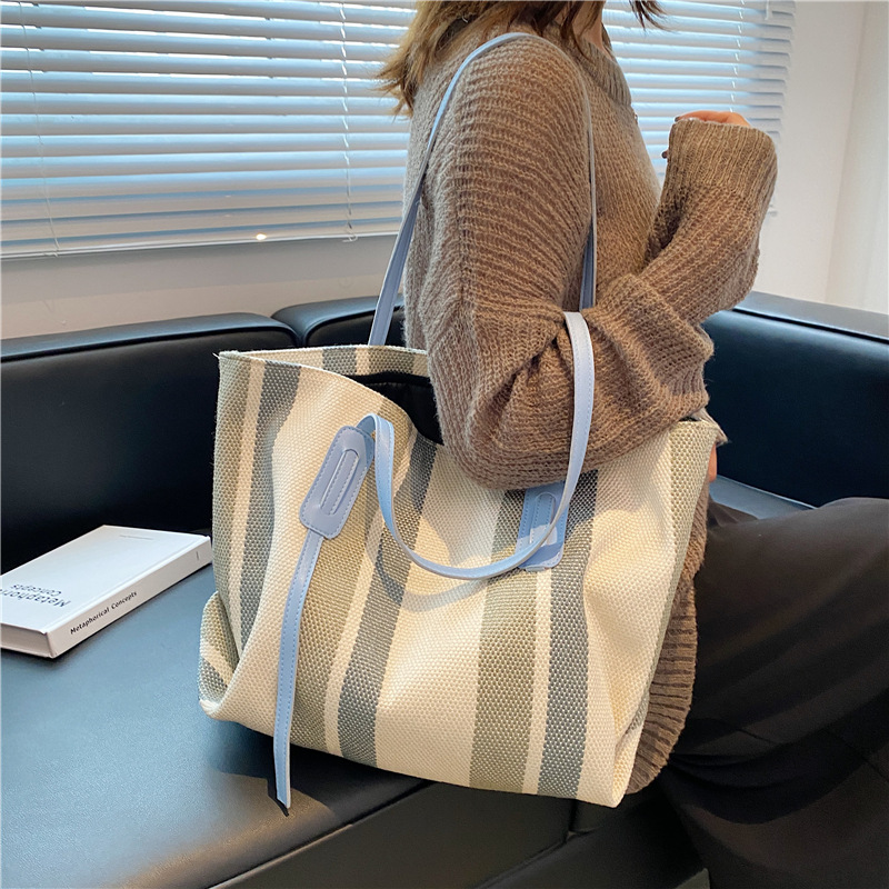 纪希琳旗舰店大容量托特包斜挎帆布包