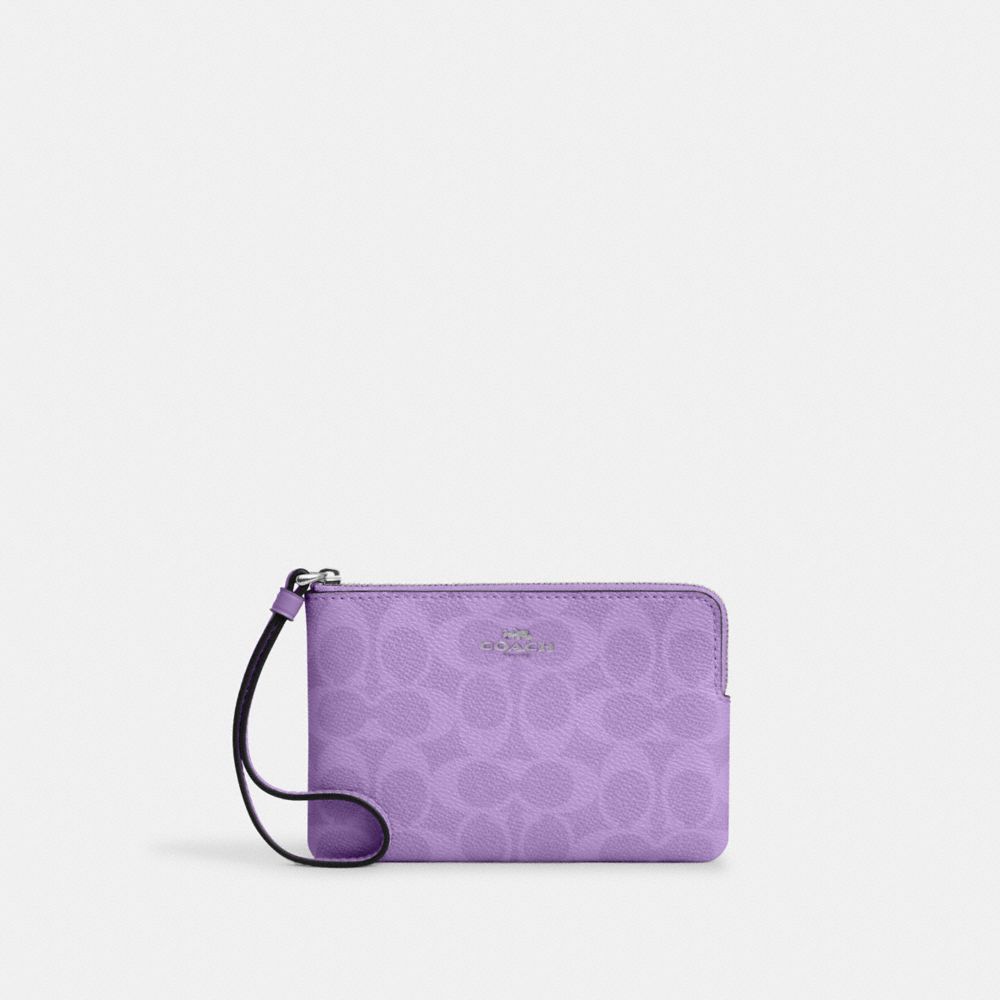 coach corner zip wristlet in signature canvas CAQ75-SV/II