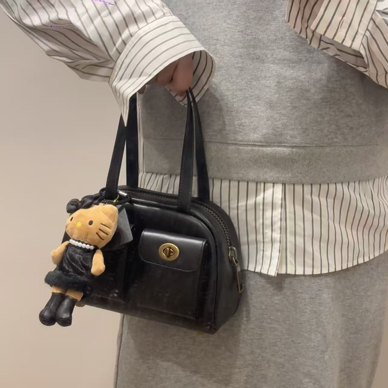 75折Coach秀款Twin Turnlock手袋限时优惠