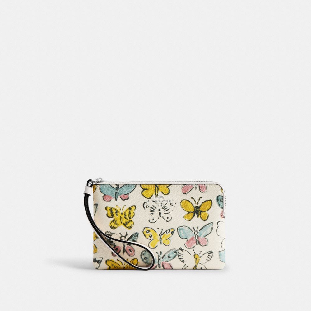 coach corner zip wristlet with butterfly print CAQ55-SVCAH