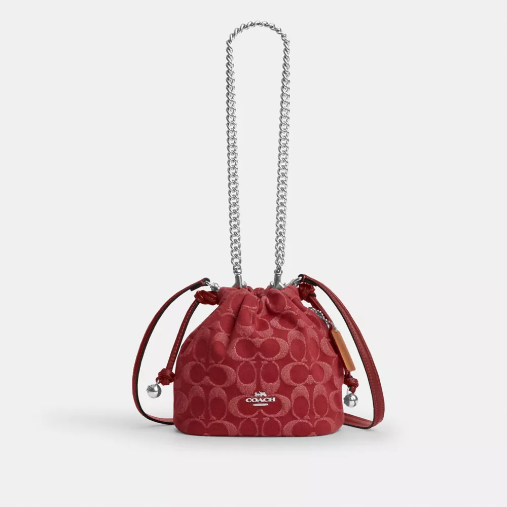 coach faye mini drawstring bag in signature denim CCZ45-SVDN8