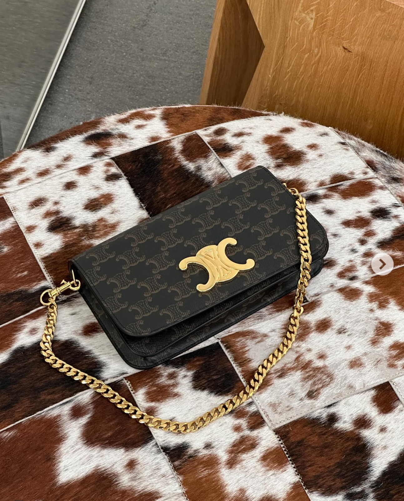 Luxury investment pieces Max Mara coats and designer bags