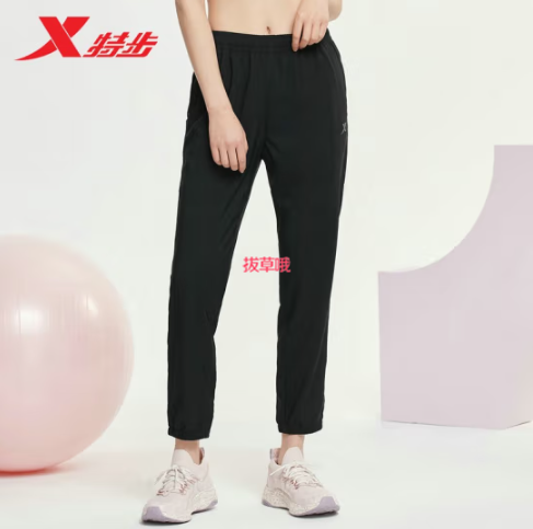 64元包邮！特步女休闲运动 裤子夏新款 小脚梭织跑步长裤