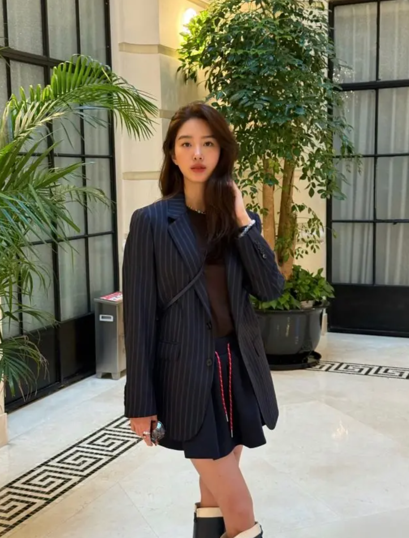 Off-duty model street style utility jackets Spring 2026