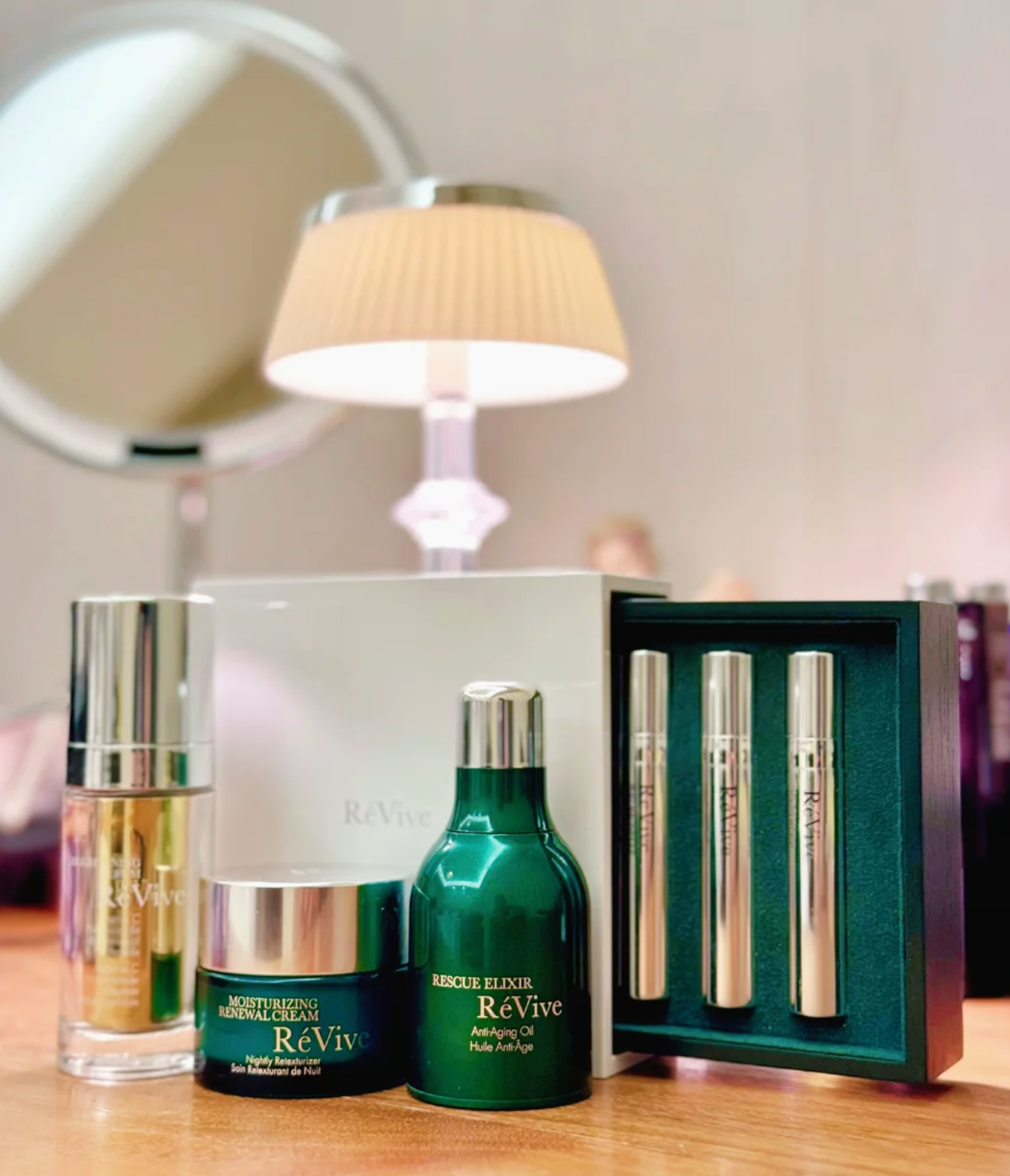 A bottle of RéVive Revitalizing Oil on a clean, white background, conveying luxury and high-end skincare.
