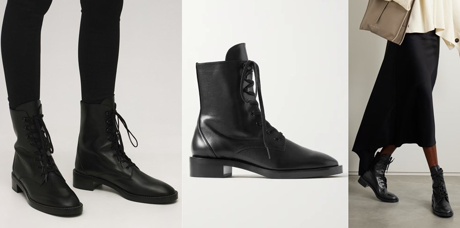 Model wearing Stuart Weitzman black leather Sondra combat boots with black skinny jeans.