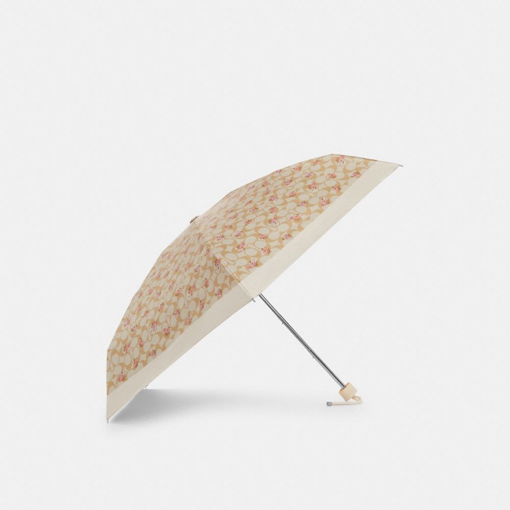 coach uv protection mini umbrella in signature floral print CBK76-SV/TA