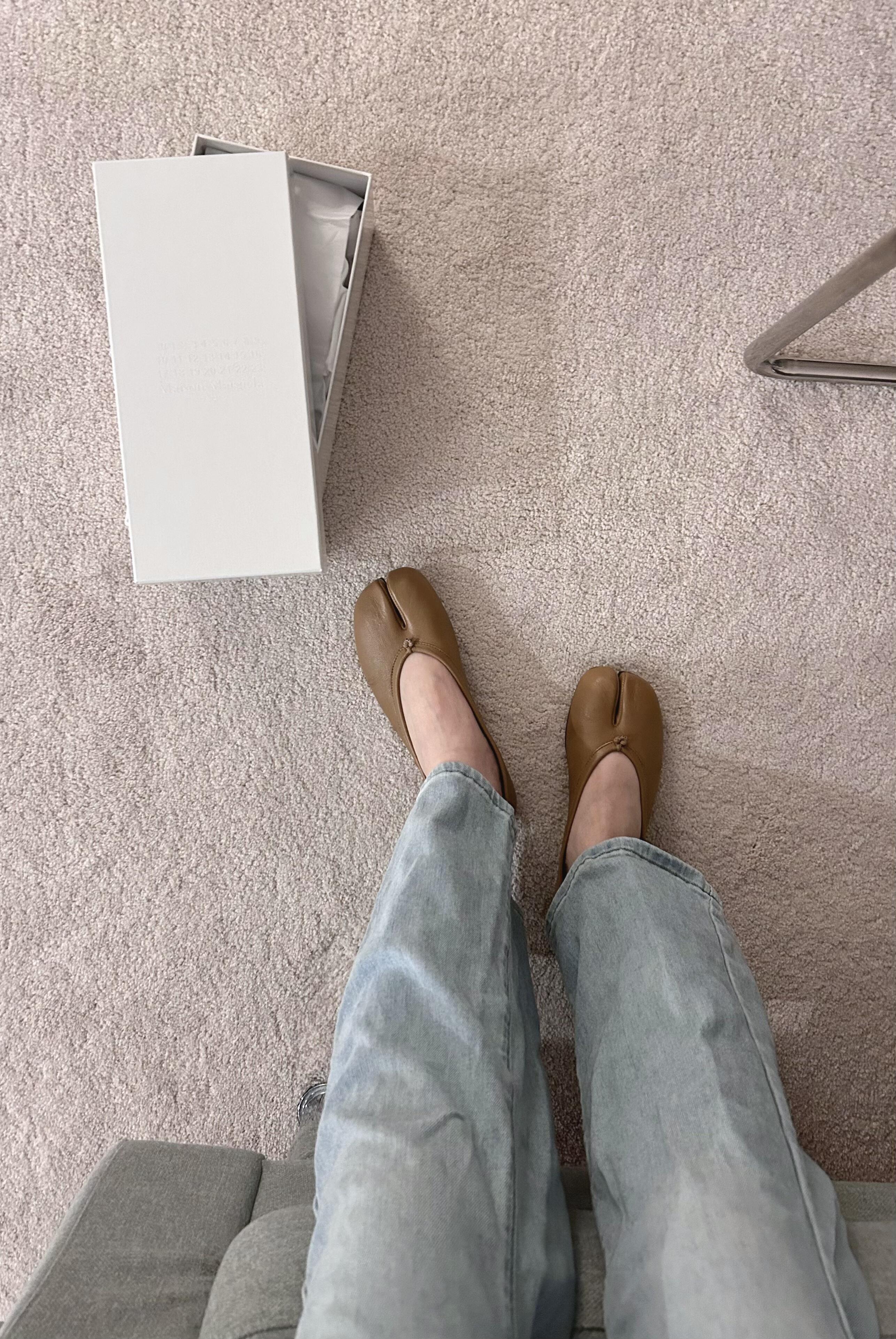 Side view of Maison Margiela shoes showing pleated design