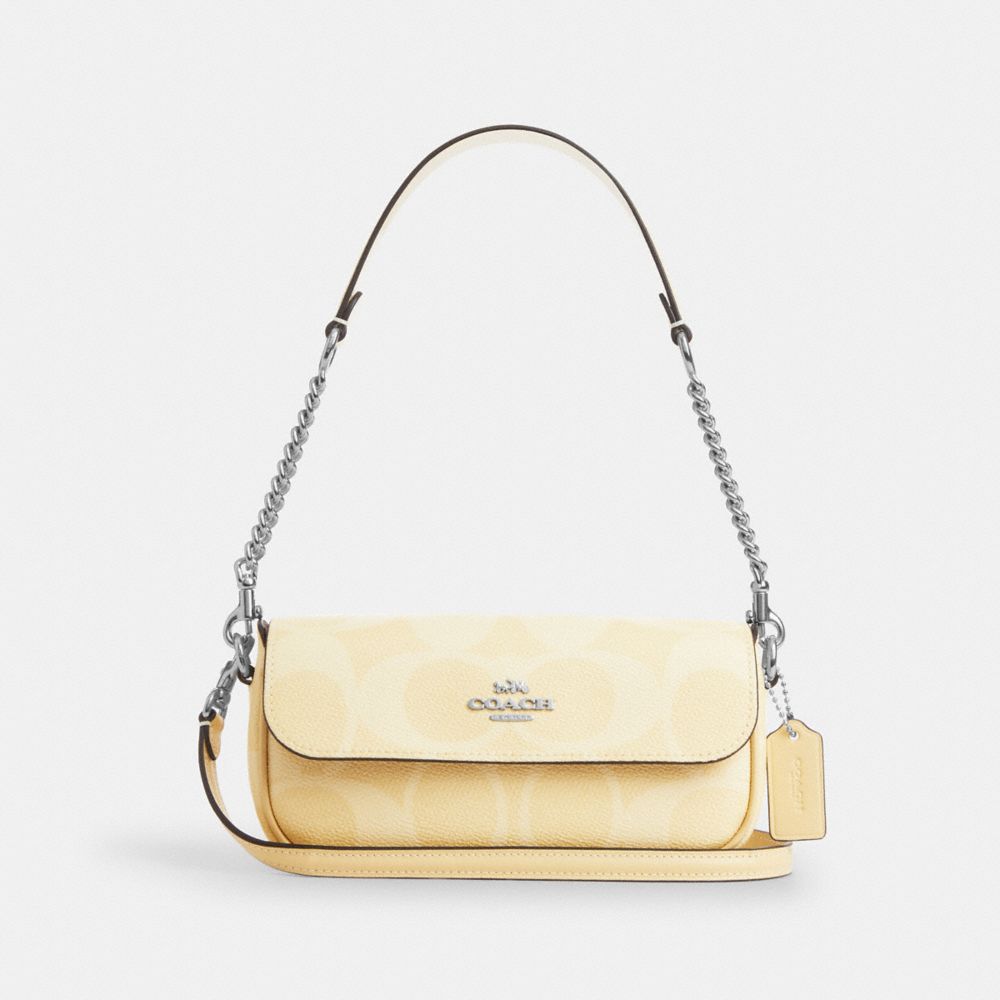 coach hailey flap bag in signature canvas CAN70-SVMN0
