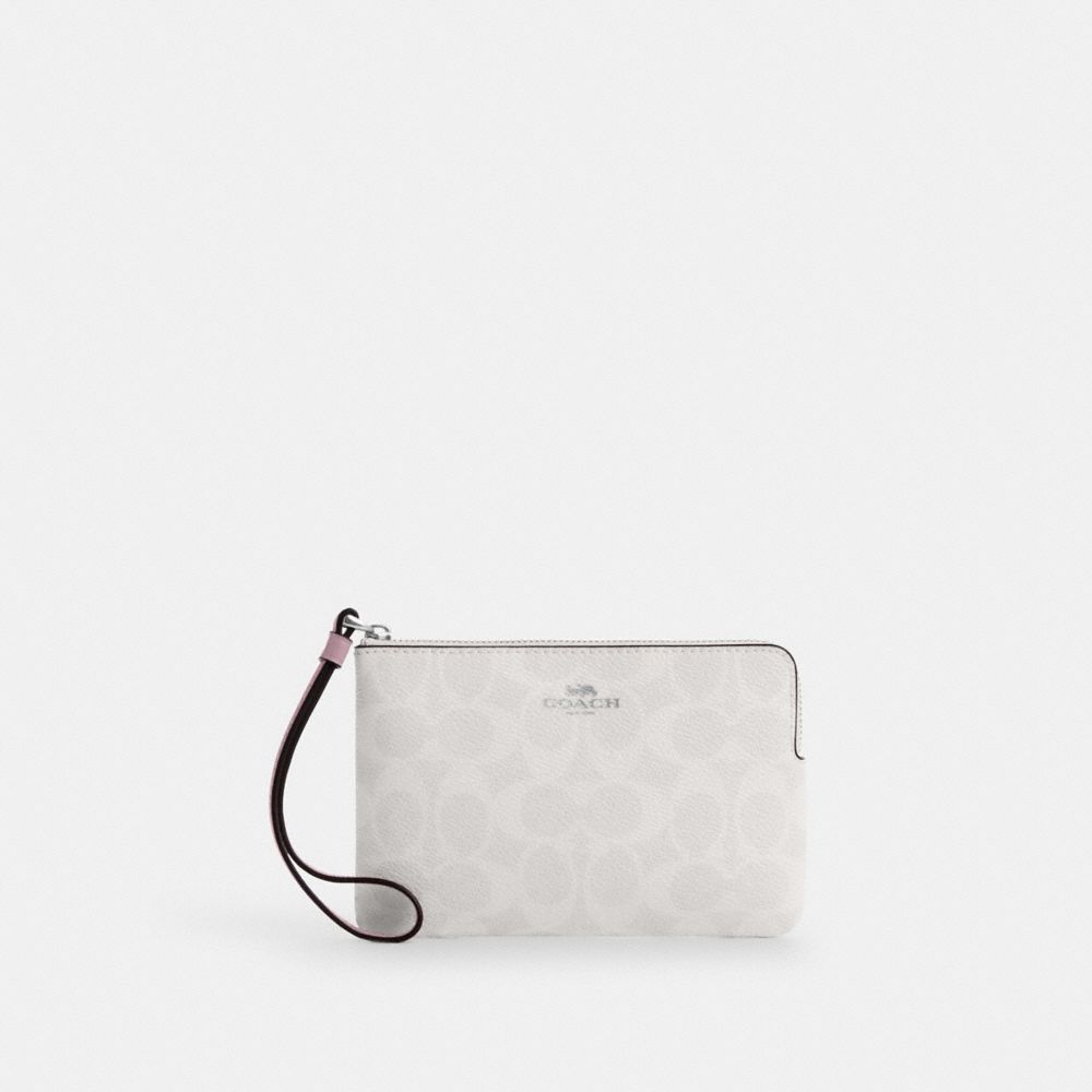 coach corner zip wristlet in signature canvas CAQ75-SVY2M
