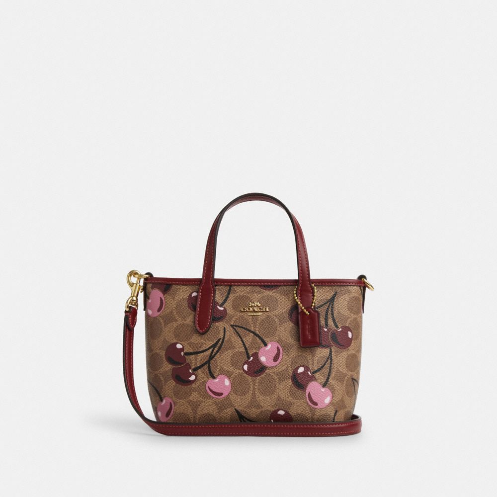 coach city mini tote bag in signature canvas with cherry print CY737-IMTAM