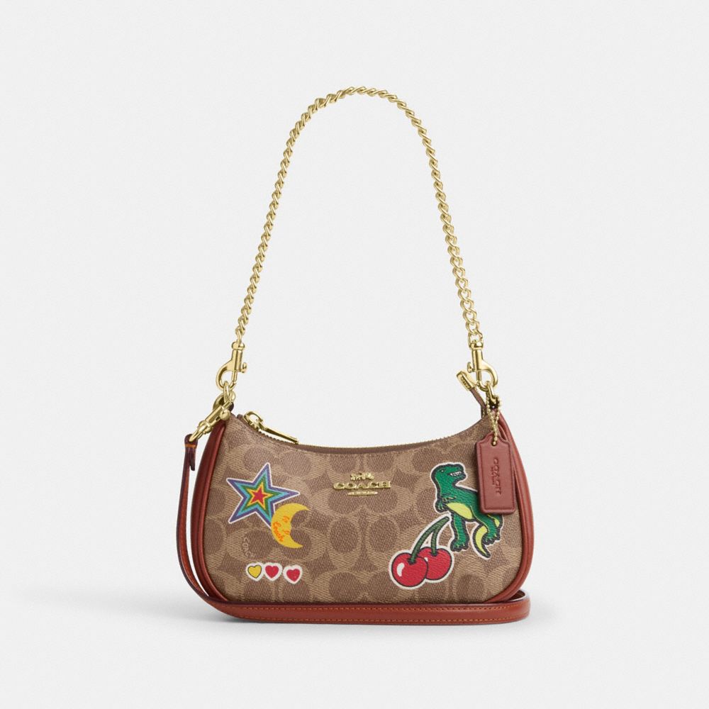 coach teri mini crossbody bag in signature canvas with sticker print