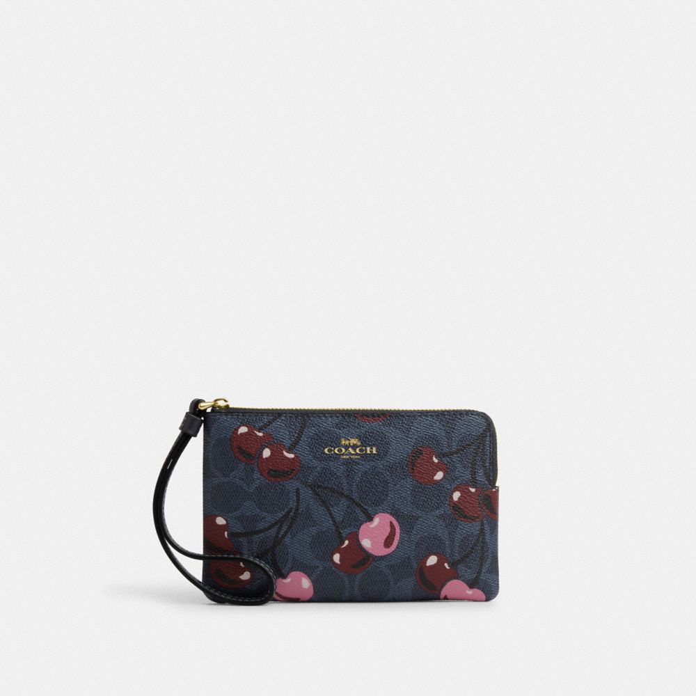 coach corner zip wristlet in signature canvas with cherry print CZ450-IMDEI