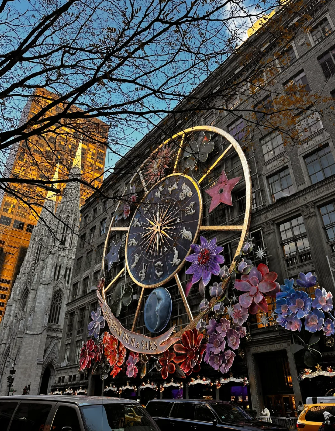 A sophisticated display of luxury designer accessories, including high-end handbags, shoes, and jewelry, illustrating the premium selection at Saks Fifth Avenue.